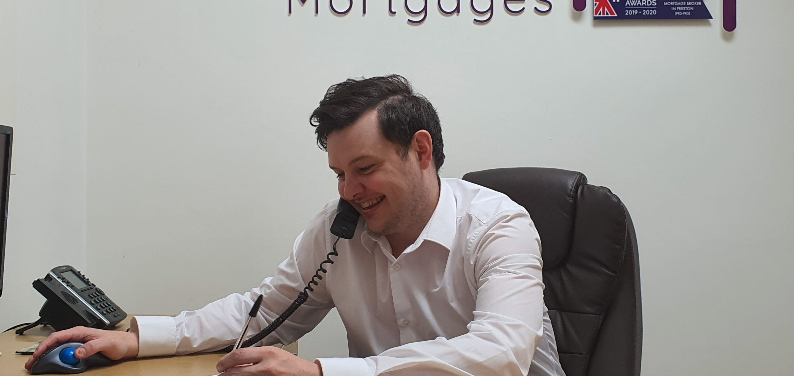 Steven on the phone, Simply Mortgages